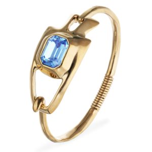 Metal alloy semi rigid bracelet plated in gold 18k with blue faceted crystal